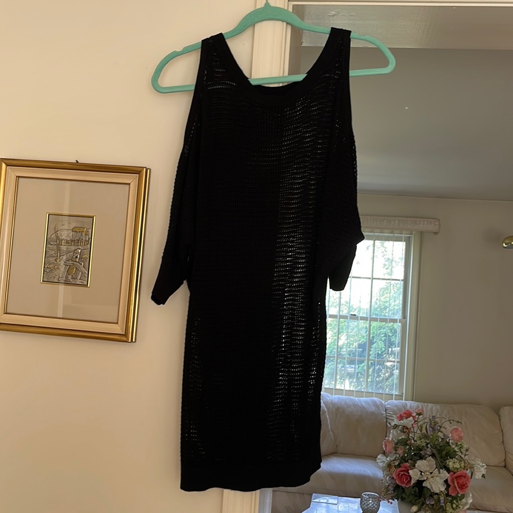 Long loose knit tunic with open shoulders